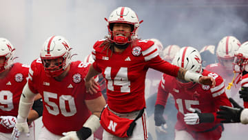 Nebraska quarterback TJ Lateef leads the Huskers out of the tunnel ahead of the game against the Iowa Hawkeyes.