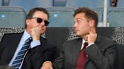 AS Roma president Dan Friedkin and his son Ryan talk during...