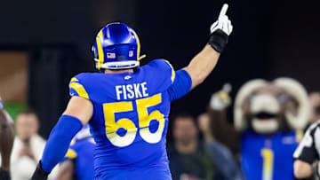 Jan 13, 2025; Glendale, AZ, USA; Los Angeles Rams defensive tackle Braden Fiske (55) celebrates a touchdown  against the Minnesota Vikings during an NFC wild card game at State Farm Stadium. Mandatory Credit: Mark J. Rebilas-Imagn Images