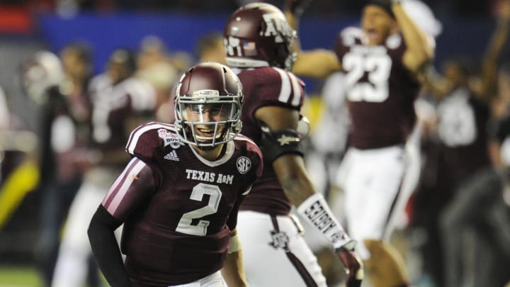 Dec 31, 2013; Atlanta, GA, USA;  Texas A&M Aggies quarterback Johnny Manziel (2) smiles after a comeback win over the Duke Blue Devils 52-48 in the 2013 Chick-fil-a Bowl at the Georgia Dome. Mandatory Credit: Dale Zanine-USA TODAY Sports