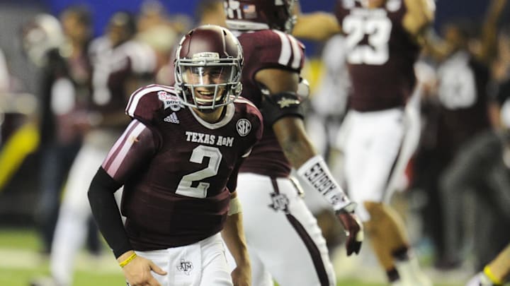 Dec 31, 2013; Atlanta, GA, USA;  Texas A&M Aggies quarterback Johnny Manziel (2) smiles after a comeback win over the Duke Blue Devils 52-48 in the 2013 Chick-fil-a Bowl at the Georgia Dome. Mandatory Credit: Dale Zanine-Imagn Images