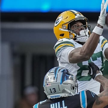 Green Bay Packers wide receiver Romeo Doubs makes a leaping catch at Carolina in 2023.