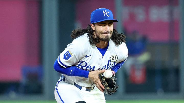 Sep 16, 2025; Kansas City, Missouri, USA; Seattle Mariners pinch runner Leo Rivas (76) slides into second base as Kansas City Royals second baseman Jonathan India (6) stops the ball during the top of the eighth inning at Kauffman Stadium. Mandatory Credit: Scott Sewell-Imagn Images
