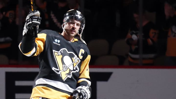 Apr 15, 2024; Pittsburgh, Pennsylvania, USA;  Pittsburgh Penguins center Sidney Crosby (87) waves to the crowd after being named first star of the game against the Nashville Predators at PPG Paints Arena. The Penguins won 4-2. Mandatory Credit: Charles LeClaire-USA TODAY Sports