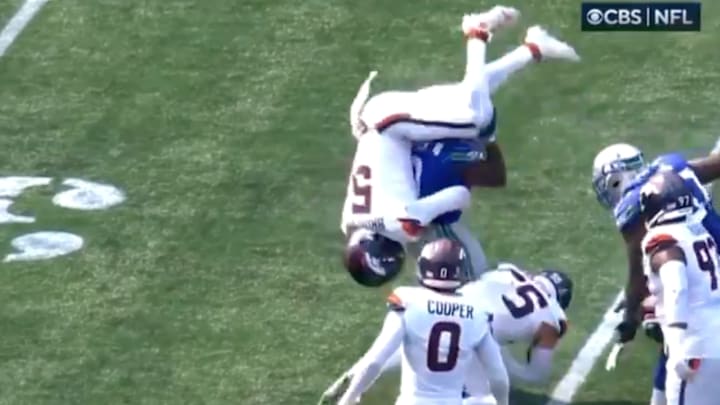 Kenneth Walker flips a defender during Week 1.