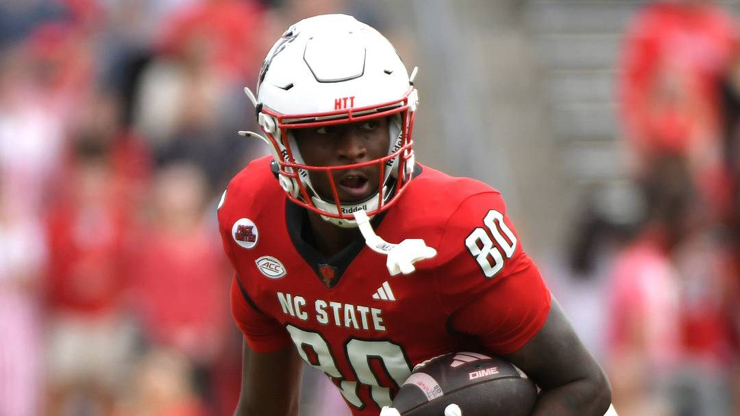 Nov 2, 2024; Raleigh, North Carolina, USA; North Carolina State Wolfpack wide receiver Terrell Anderson (80) runs the ball against the Stanford Cardinals during the second half at Carter-Finley Stadium. Mandatory Credit: Zachary Taft-Imagn Images