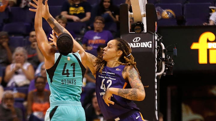 Mercury's Brittany Griner (42) defends Liberty's Kiah Stokes (41) as she goes for a layup during the first half at Talking Stick Resort Arena in Phoenix, Ariz. on Aug. 19, 2018. 

865709002