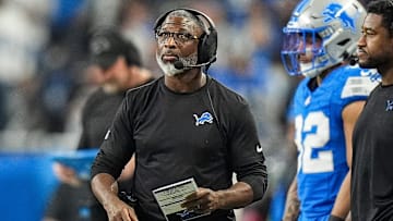 Detroit Lions defensive coordinator Aaron Glenn watches a replay during the first half of the 45-31 loss to the Washington Commanders in the NFC divisional round of the NFL playoffs at Ford Field in Detroit on Saturday, Jan. 18, 2025.