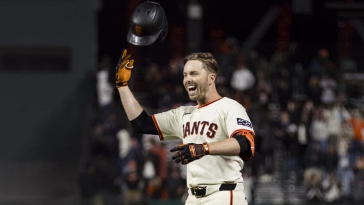 Jun 10, 2024; San Francisco, California, USA; San Francisco Giants pinch hitter Austin Slater (13) reacts after hitting a walk-off RBI single against the Houston Astros during the tenth inning at Oracle Park. Mandatory Credit: John Hefti-USA TODAY Sports