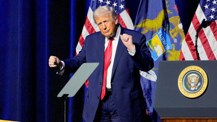 President Donald Trump dances after ending his his remarks to the Detroit Economic Club at Soundboard inside the MotorCity Casino Hotel in Detroit on Tuesday, Jan. 13, 2026.