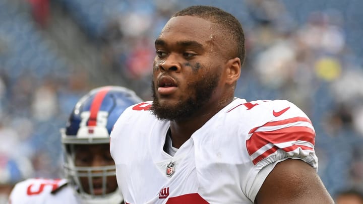 Sep 11, 2022; Nashville, Tennessee, USA; New York Giants offensive tackle Evan Neal (73) leaves the field after warmups before the game against the Tennessee Titans at Nissan Stadium.  