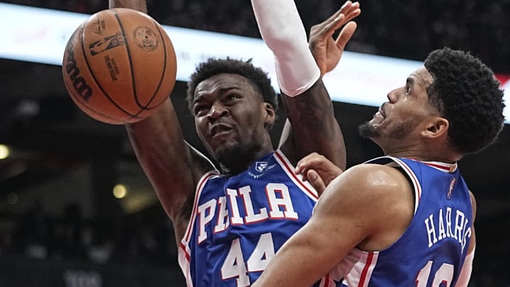 Apr 7, 2022; Toronto, Ontario, CAN; Philadelphia 76ers forward Paul Reed (44) collides with forward Tobias Harris (12) after dunking the ball against the Toronto Raptors during the first half at Scotiabank Arena. Mandatory Credit: John E. Sokolowski-USA TODAY Sports