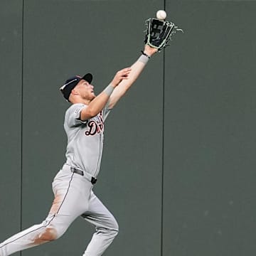 Sep 17, 2024; Kansas City, Missouri, USA; Detroit Tigers center fielder Parker Meadows (22) makes a catch at the wall during the third inning against the Kansas City Royals at Kauffman Stadium. 