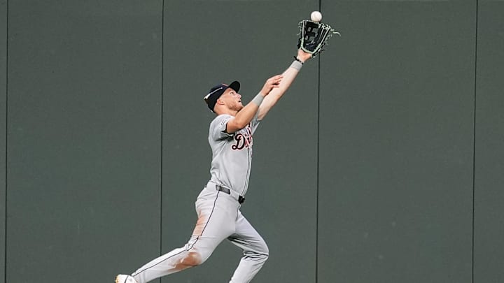 Sep 17, 2024; Kansas City, Missouri, USA; Detroit Tigers center fielder Parker Meadows (22) makes a catch at the wall during the third inning against the Kansas City Royals at Kauffman Stadium. 