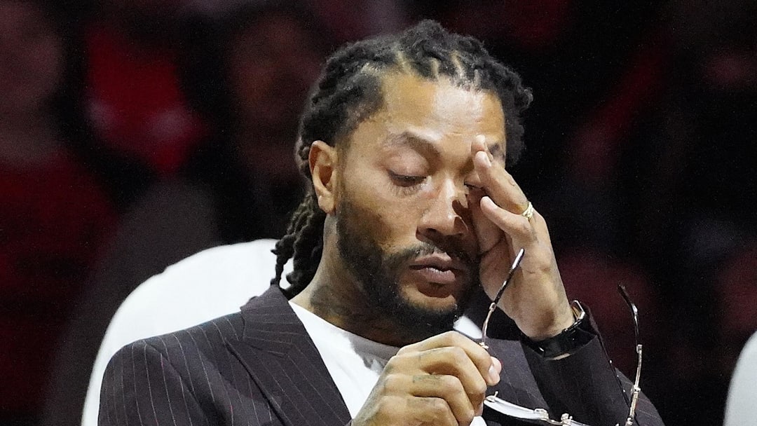 Jan 4, 2025; Chicago, Illinois, USA; Chicago Bulls and New York Knicks former player Derrick Rose reacts as he is honored at halftime of a game between the Chicago Bulls and the New York Knicks at United Center. Mandatory Credit: David Banks-Imagn Images