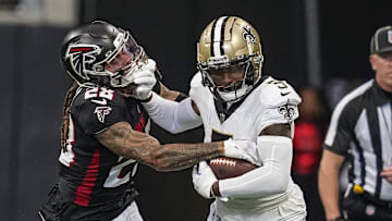 Sep 11, 2022; Atlanta, Georgia, USA; New Orleans Saints wide receiver Jarvis Landry (5) runs against Atlanta Falcons cornerback Mike Ford (28) during the first half at Mercedes-Benz Stadium. Mandatory Credit: Dale Zanine-Imagn Images