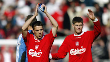 Michael Owen and Steven Gerrard of Liverpool applaud the fans
