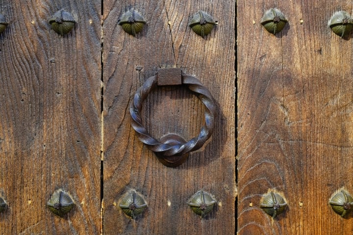 Dead as a doornail: door knocker and door nails are pictured.