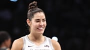 Las Vegas Aces guard Kelsey Plum (10) smiles on the court during Game 2 of the WNBA Semifinals against the New York Liberty. 