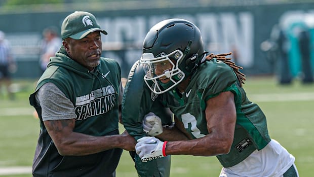 Michigan State WR Rodney Bullard Jr. and WR coach Courtney Hawkins.