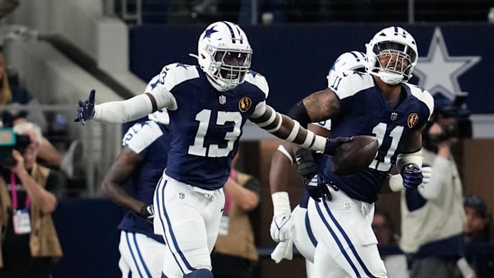 Dallas Cowboys linebacker DeMarvion Overshown celebrates after scoring a touchdown against the New York Giants. Dallas Cowboys linebacker DeMarvion Overshown celebrates after scoring a touchdown against the New York Giants.