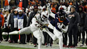 Nov 29, 2025; Charlottesville, Virginia, USA; Virginia Cavaliers wide receiver Kameron Courtney (5) is pushed out of bounds after a catch by Virginia Tech Hokies cornerback Thomas Williams (23) in the second quarter at Scott Stadium. Mandatory Credit: Geoff Burke-Imagn Images