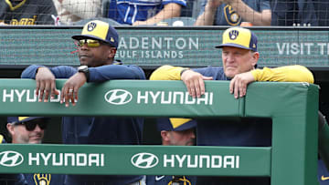 May 25, 2025; Pittsburgh, Pennsylvania, USA;  Milwaukee Brewers associate manager Rickie Weeks Jr. (left) and manager Pat Murphy (right) look on over the dugout railing against the Pittsburgh Pirates during the ninth inning at PNC Park. Mandatory Credit: Charles LeClaire-Imagn Images
