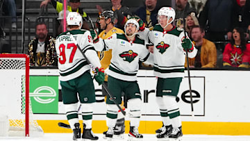 Feb 12, 2024; Las Vegas, Nevada, USA; Minnesota Wild right wing Mats Zuccarello (36) celebrates with Minnesota Wild left wing Kirill Kaprizov (97) and Minnesota Wild center Joel Eriksson Ek (14) after scoring a goal against the Vegas Golden Knights during the first period at T-Mobile Arena. Mandatory Credit: Stephen R. Sylvanie-Imagn Images