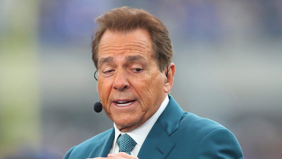 ESPN analyst and retired Alabama head coach Nick Saban broadcasts live from the sidelines of Acrisure Stadium in Pittsburgh, PA prior to the start of the Pittsburgh Panthers vs Notre Dame Fighting Irish game on November 15, 2025.