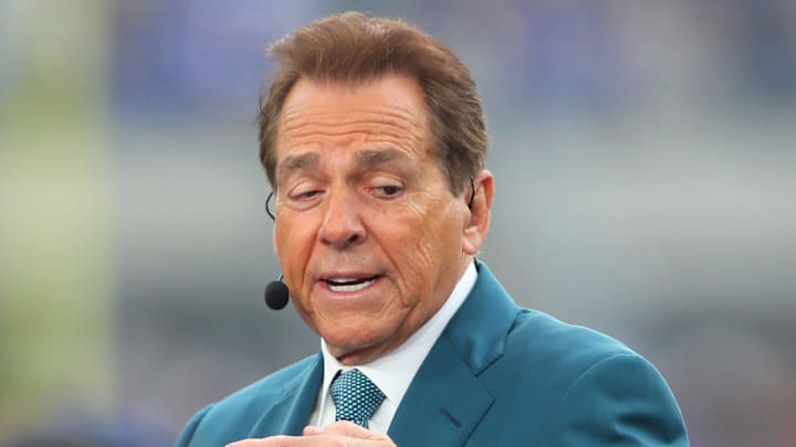 ESPN analyst and retired Alabama head coach Nick Saban broadcasts live from the sidelines of Acrisure Stadium in Pittsburgh, PA prior to the start of the Pittsburgh Panthers vs Notre Dame Fighting Irish game on November 15, 2025.