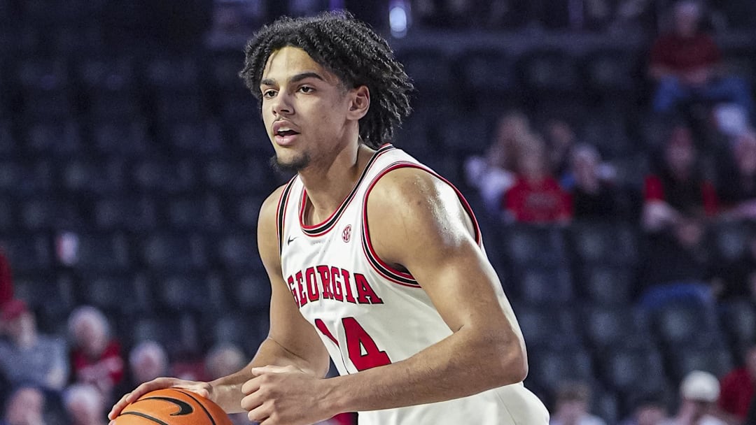 Feb 5, 2025; Athens, Georgia, USA; Georgia Bulldogs forward Asa Newell (14) handles the ball against the LSU Tigers during the second half at Stegeman Coliseum.