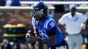 Oct 18, 2025; Durham, North Carolina, USA;  Duke Blue Devils quarterback Darian Mensah (10) runs with the ball  during the first half of the game against Georgia Tech Yellow Jackets at Wallace Wade Stadium. Mandatory Credit: Jaylynn Nash-Imagn Images