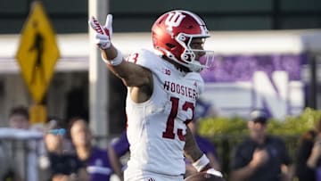 Oct 5, 2024; Evanston, Illinois, USA; Indiana Hoosiers wide receiver Elijah Sarratt (13) gestures for a first down against the Northwestern Wildcats during the second half at Lanny and Sharon Martin Stadium. 