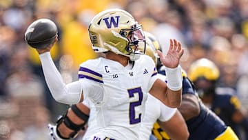 Washington quarterback Demond Williams Jr. (2) makes a pass against Michigan during the first half at Michigan Stadium in Ann Arbor on Saturday, Oct. 18, 2025.