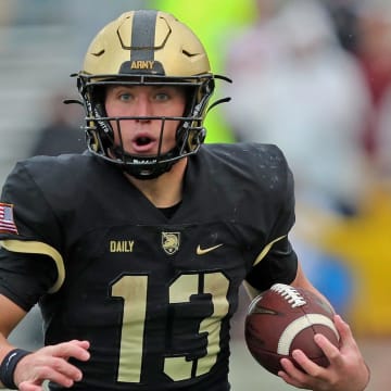 Oct 7, 2023; West Point, New York, USA; Army Black Knights quarterback Bryson Daily (13) carries the ball against the Boston College Eagles during the second half at Michie Stadium. Mandatory Credit: Danny Wild-USA TODAY Sports