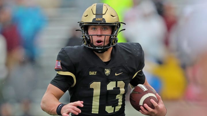 Oct 7, 2023; West Point, New York, USA; Army Black Knights quarterback Bryson Daily (13) carries the ball against the Boston College Eagles during the second half at Michie Stadium. Mandatory Credit: Danny Wild-USA TODAY Sports