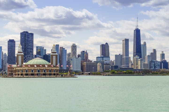 The Chicago skyline looms over Lake Michigan.