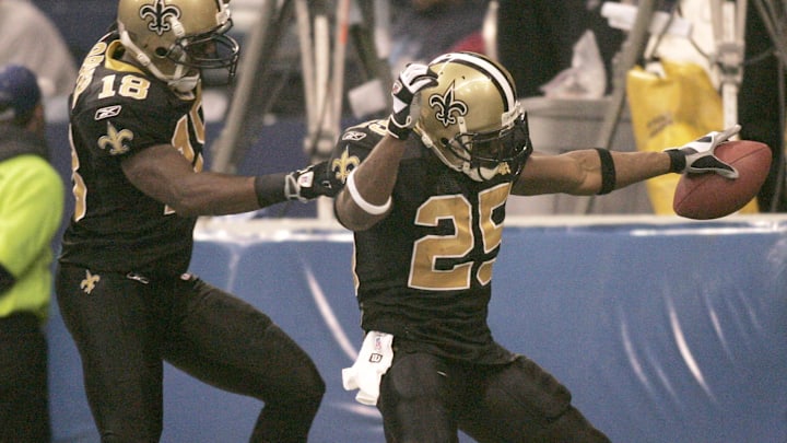 Dec 10, 2006; Irving, TX, USA; New Orleans Saints running back (25) Reggie Bush and wide receiver (18) Terrance Copper celebrate a touchdown during the third quarter against the Dallas Cowboys at Texas Stadium. Mandatory Credit: Photo by Tim Heitman-Imagn Images (c) copyright 2006 Tim Heitman