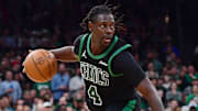 May 14, 2025; Boston, Massachusetts, USA; Boston Celtics guard Jrue Holiday (4) controls the ball in the second half during game five of the second round for the 2025 NBA Playoffs against the New York Knicks at TD Garden. Mandatory Credit: Bob DeChiara-Imagn Images