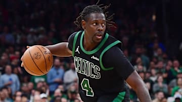May 14, 2025; Boston, Massachusetts, USA; Boston Celtics guard Jrue Holiday (4) controls the ball in the second half during game five of the second round for the 2025 NBA Playoffs against the New York Knicks at TD Garden. Mandatory Credit: Bob DeChiara-Imagn Images