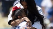 The Los Angeles Dodgers celebrated Kobe Bryant's legacy with a special day dedicated to the late basketball legend. Pictured is Kobe's daughter, Bianka, 7, who threw the first pitch.