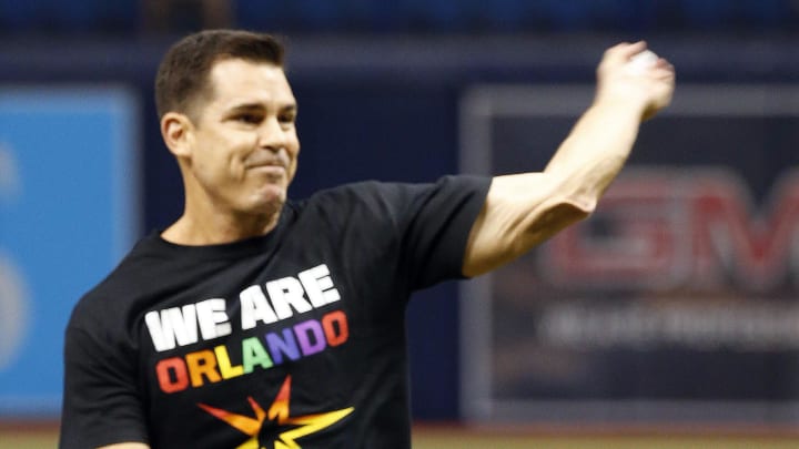 Jun 17, 2016; St. Petersburg, FL, USA;  MLB Vice President of Social Responsibility and inclusion Billy Bean throws out to first pitch before the game between the Tampa Bay Rays and San Francisco Giants as he pays tribute to the victims lost in the Orlando shooting last Sunday before the game at Tropicana Field. Mandatory Credit: Kim Klement-USA TODAY Sports