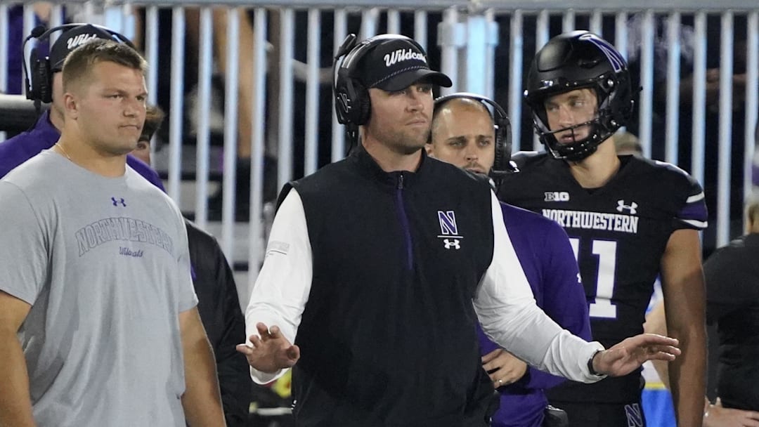Sep 14, 2024; Evanston, Illinois, USA; Northwestern Wildcats head coach David Braun gestures to his team against the Eastern Illinois Panthers during the first half at Lanny and Sharon Martin Stadium. Mandatory Credit: David Banks-Imagn Images