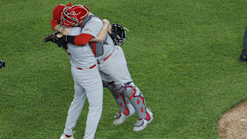 May 9, 2025; Washington, District of Columbia, USA; St. Louis Cardinals pitcher Erick Fedde (12) celebrates with Cardinals catcher Pedro Pagés (43) after throwing a complete game shutout against the Washington Nationals at Nationals Park. Mandatory Credit: Geoff Burke-Imagn Images