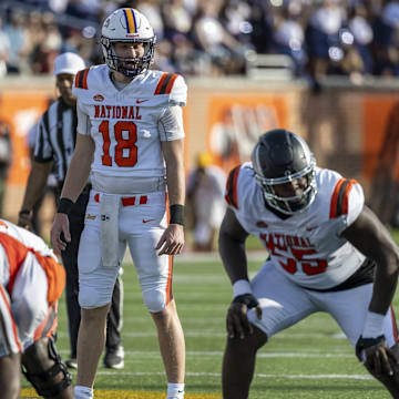 Feb 1, 2025; Mobile, AL, USA; National team quarterback Taylor Elgersma of Laurier (18) sets up for a play against the American team during the second half of the 2025 Senior Bowl at Hancock Whitney Stadium. 