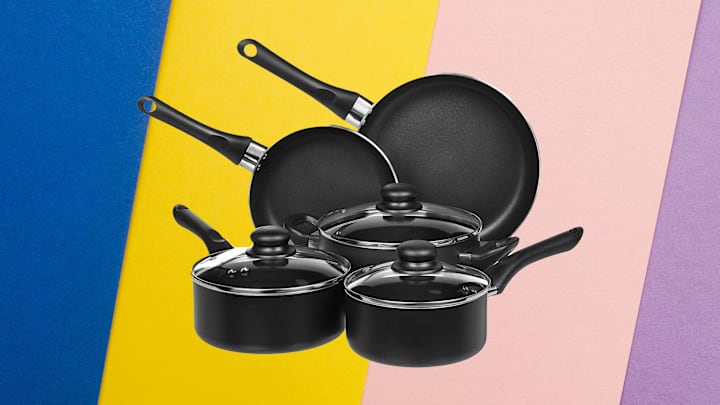 Amazon Basics cookware set against multi-colored background.