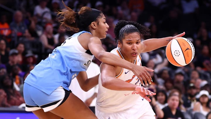 Aug 28, 2025; Phoenix, Arizona, USA; Phoenix Mercury forward Alyssa Thomas (25) drives to the basket against Chicago Sky forward Angel Reese (5) in the second half at Phx Arena. Mandatory Credit: Mark J. Rebilas-Imagn Images