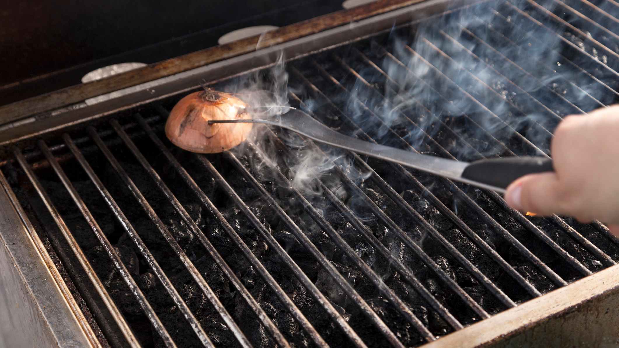 This Onion Hack Makes Cleaning Your Grill Quick and Easy