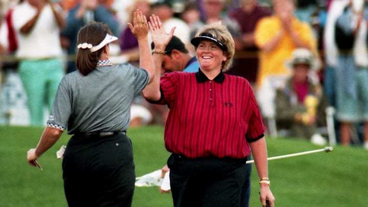 Runner-up Meg Mallon, left, congratulates Sara Lee Classic champion Laura Davies on the 18th green at the Hermitage Golf Course in Nashville on May 8, 1994. Davies won by a single shot over defending champion Mallon before an estimated 19,000 fans, the largest Sunday crowd in the seven-year history of the LPGA event.