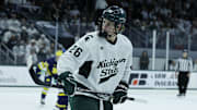 Michigan State Spartans center Eric Nilson looks towards a teammate before a faceoff against the Michigan Wolverines on Friday, Dec. 5, 2025, at Munn Ice Arena.